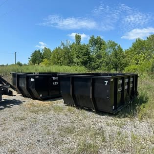 Two 13 yard dumpsters on a commercial site